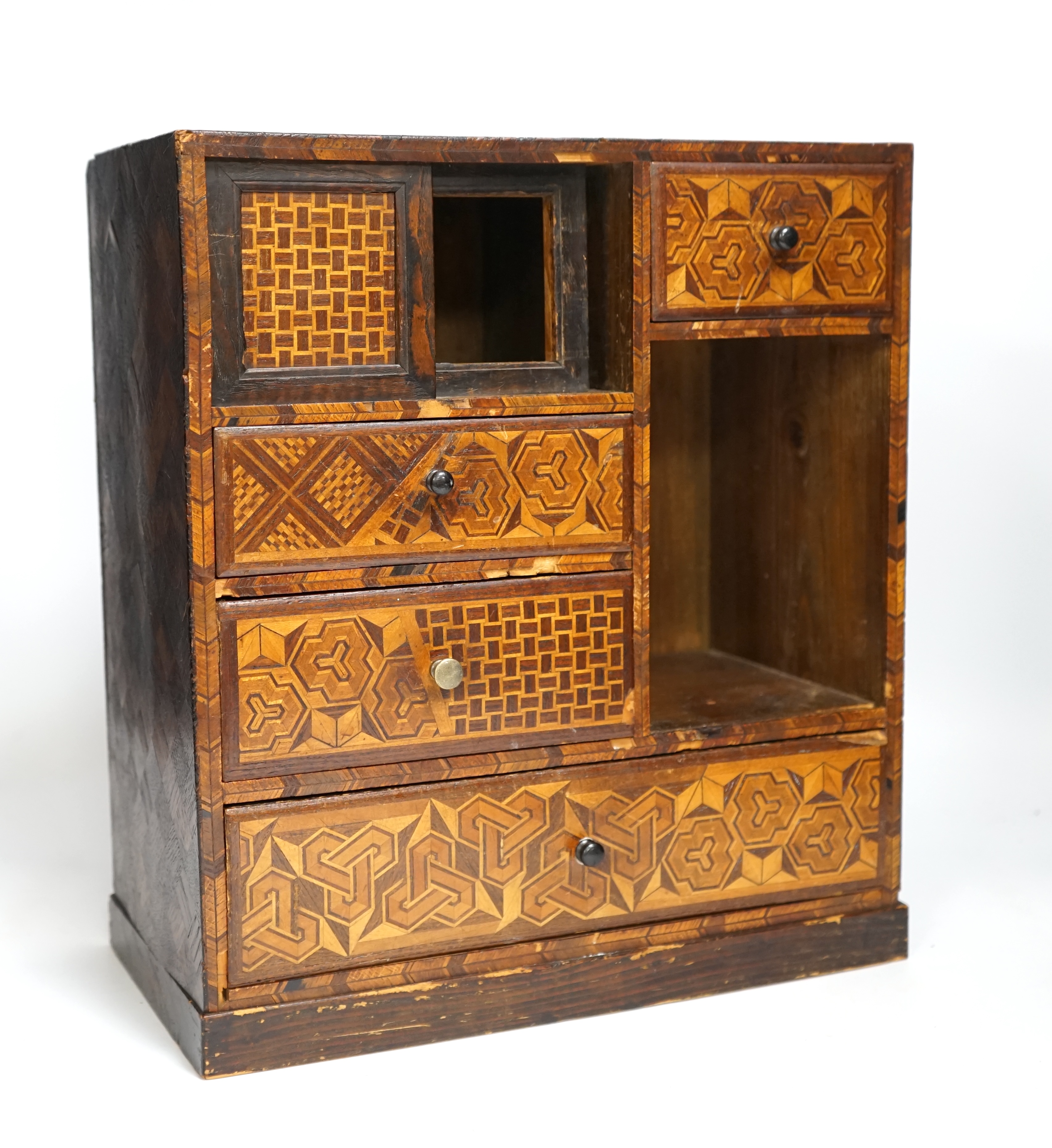 A late 19th century Japanese Hakone ware marquetry inlaid miniature cabinet, 34cm tall